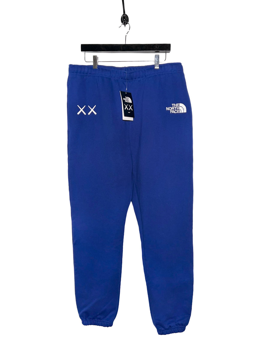 The North Face X KAWS Bolt Blue Sweatpants – Boutique LUC.S