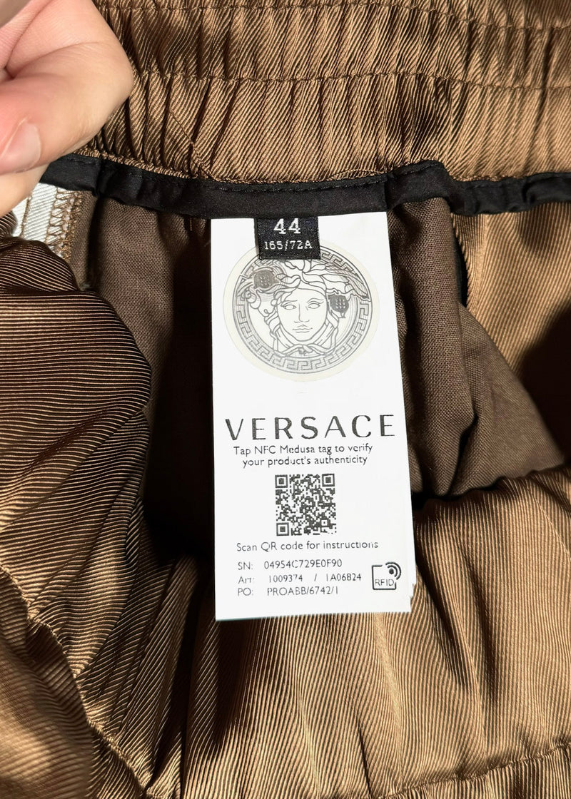 Pantalon style survêtement latéral marron à imprimé Barocco à jambe large Versace