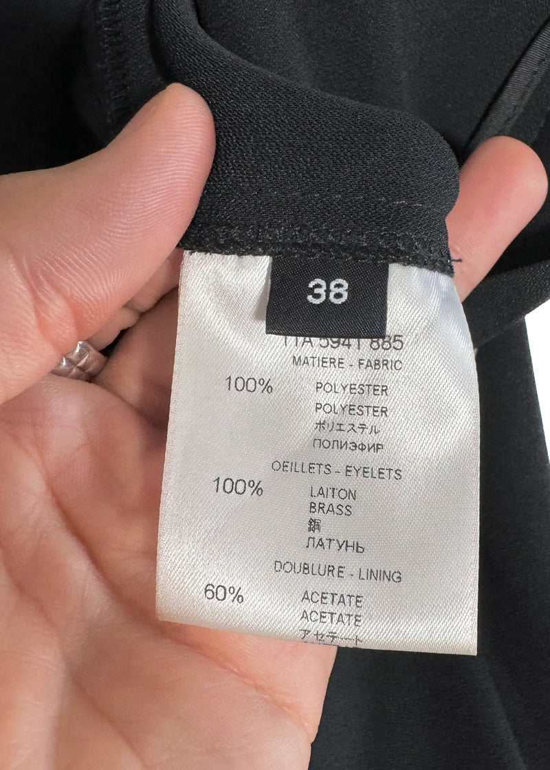 Pantalon sarouel orné d'œillets noirs Givenchy