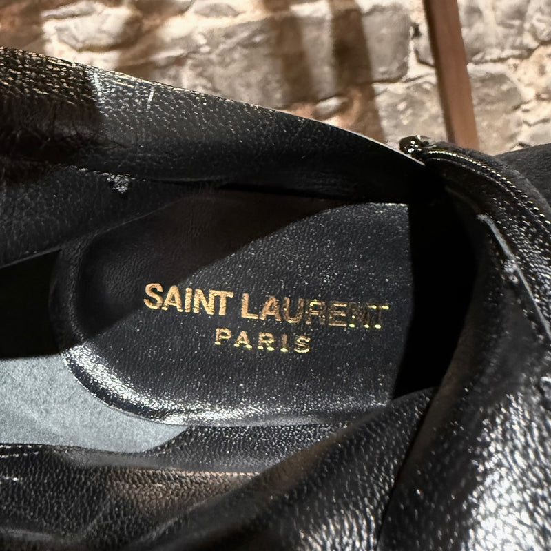 Bottines à talon et bride cheville en daim verni noir Saint Laurent