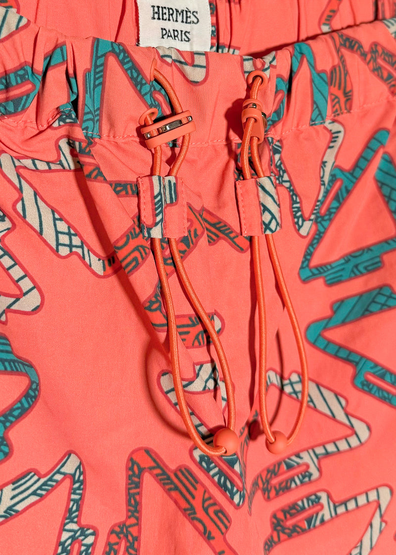 Hermès Coral Pink Triangle Pattern Swim Trunks