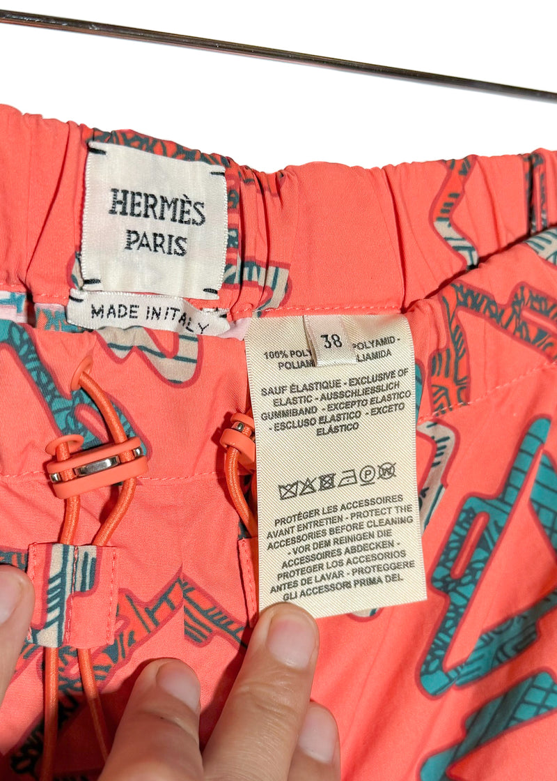 Hermès Coral Pink Triangle Pattern Swim Trunks