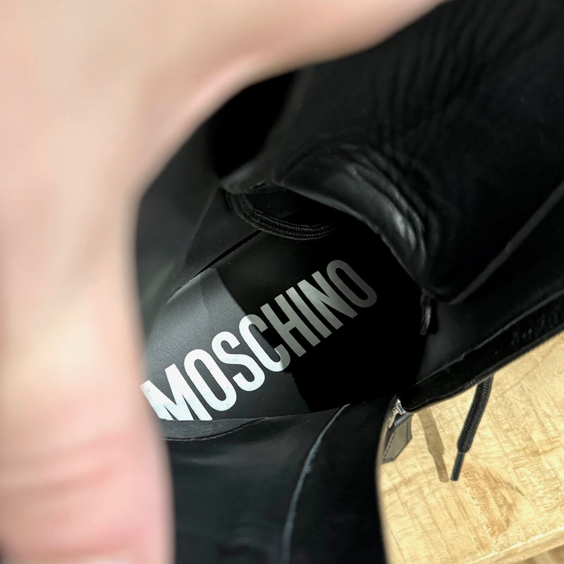 Bottes de combat à lacets en cuir noir Moschino