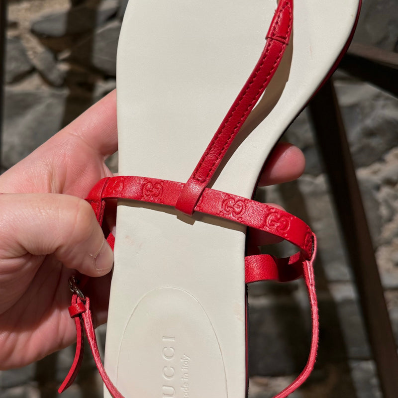 Gucci Red GG Embossed T-strap Flat Sandals