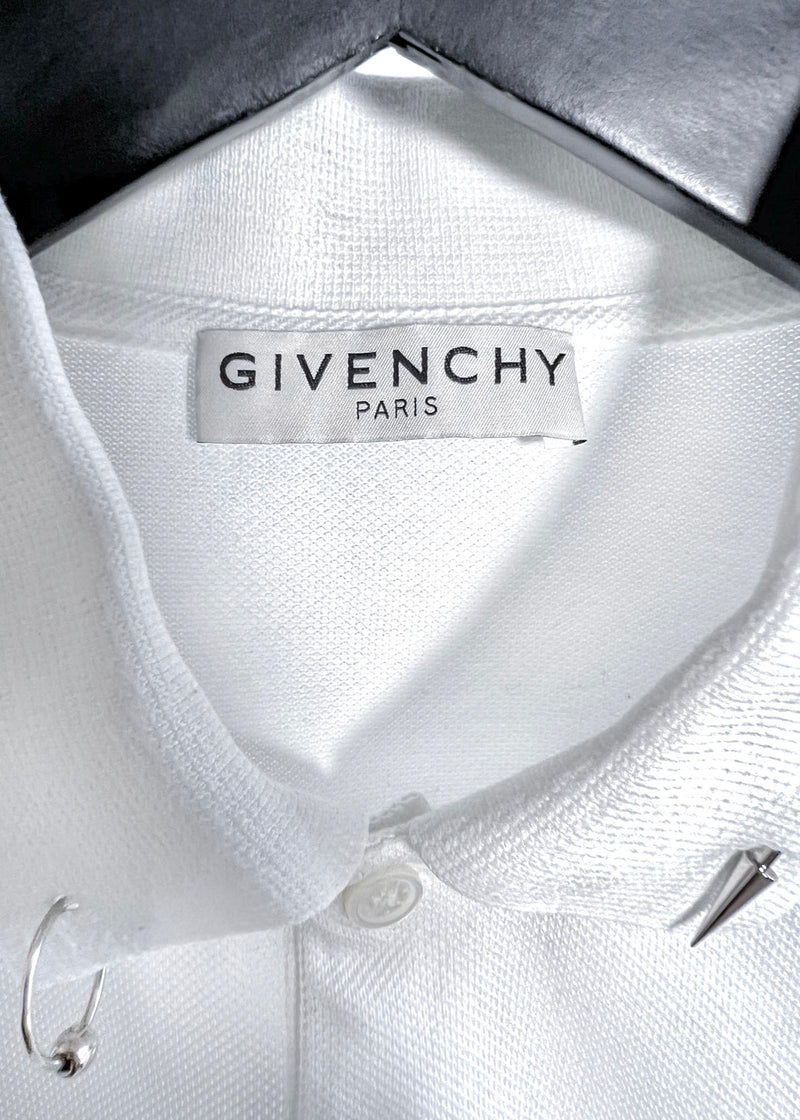 Polo piqué blanc Givenchy avec détail de piercings