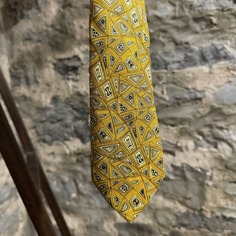 Cravate en soie à imprimé abstrait Hermès ocre et or