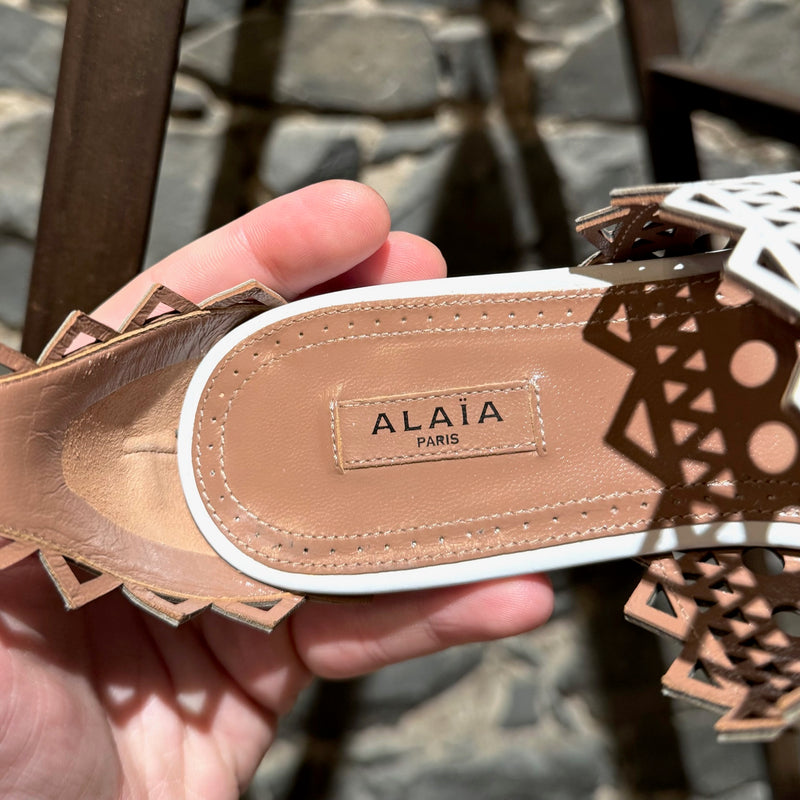 Alaïa White Laser Cut Flat Sandals