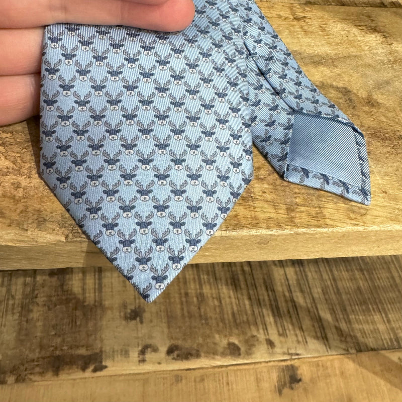Cravate en soie bleue imprimé rennes Hermès