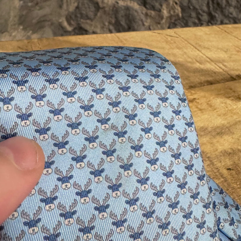Cravate en soie bleue imprimé rennes Hermès