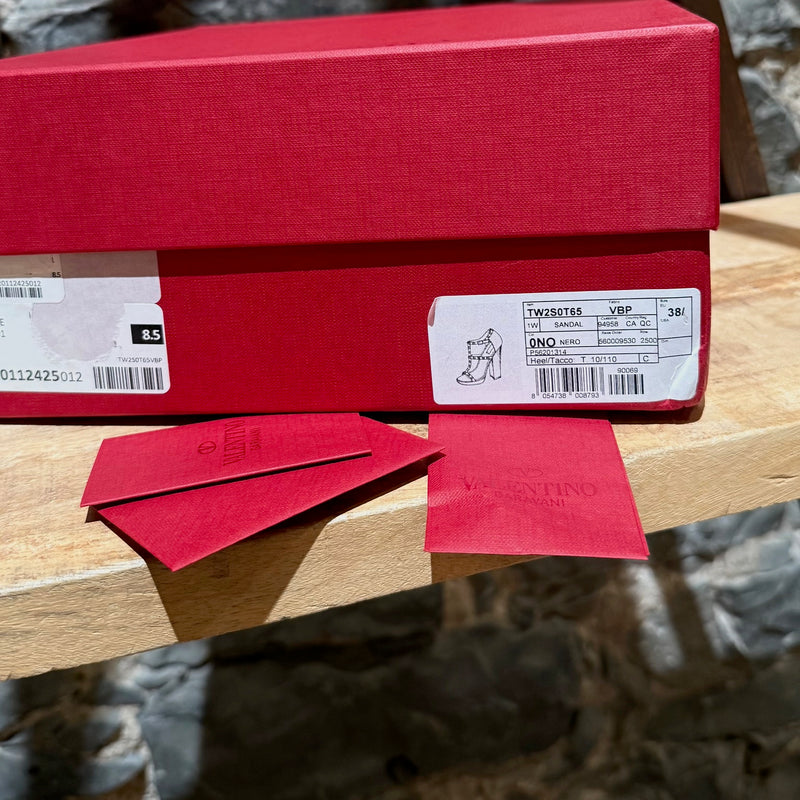 Box and brand cards of Valentino Black Smooth Leather Rockstud Block Heel Sandals