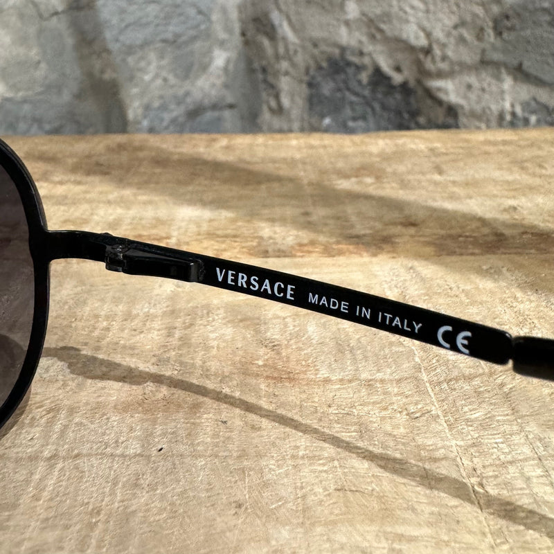 Lunettes de soleil noires bouclier Versace 2051 Medusa