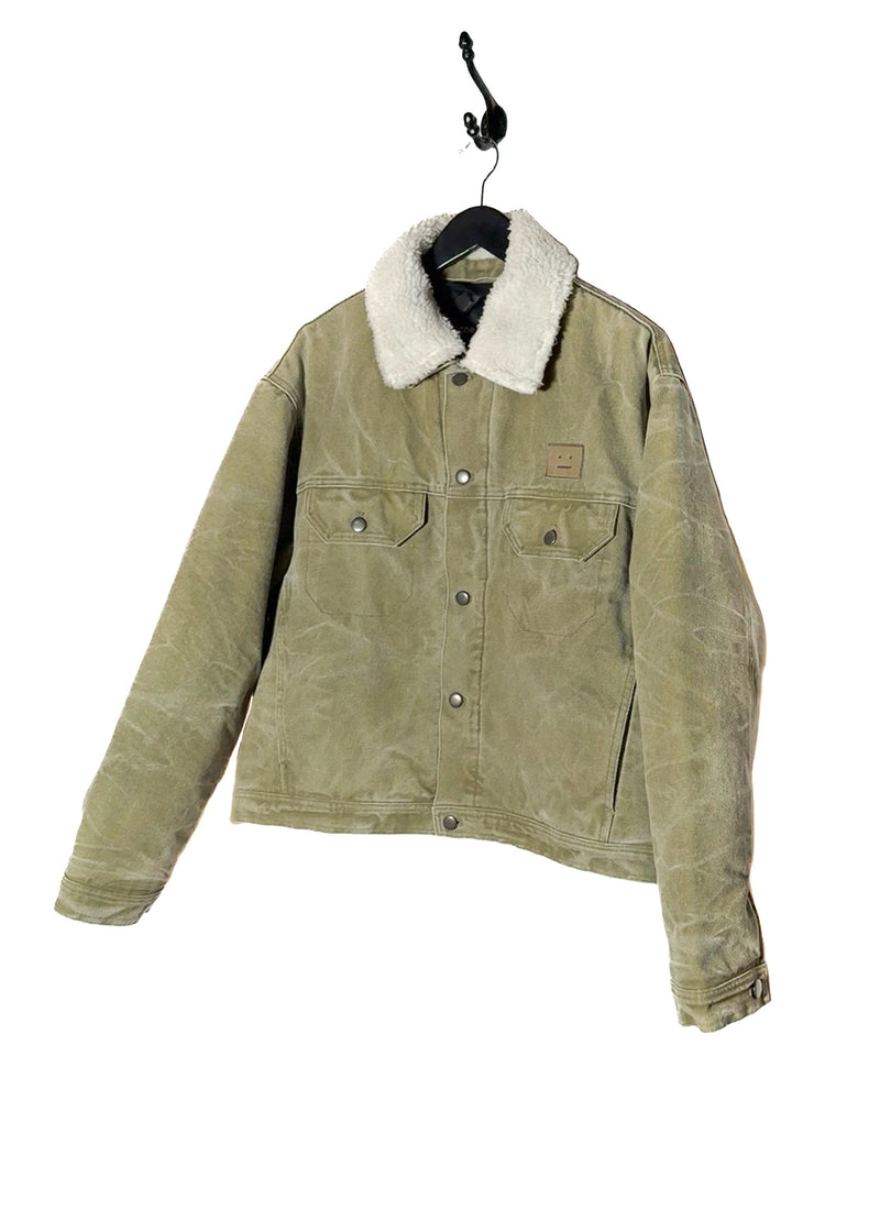 Front side of Acne Studios Green Canvas Faux Shearling Orsan Trucker Jacket