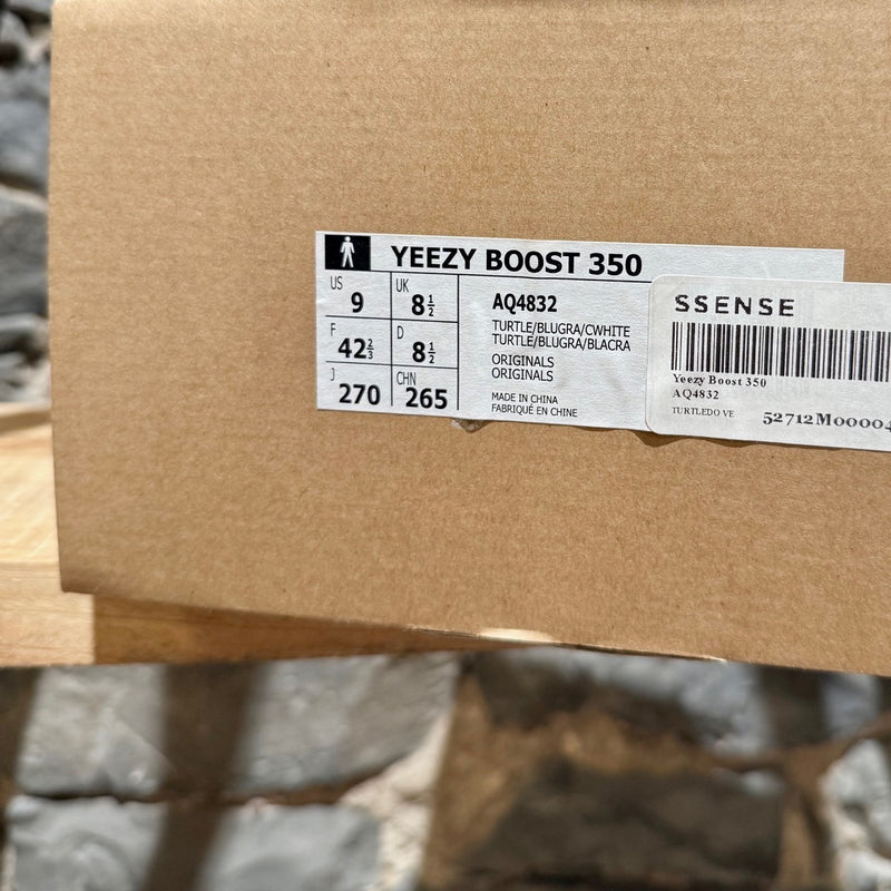 Packaging of Adidas YEEZY 350 Turtle Dove White Low-top Sneakers