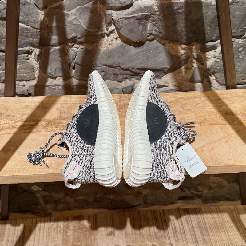 Sides of Adidas YEEZY 350 Turtle Dove White Low-top Sneakers