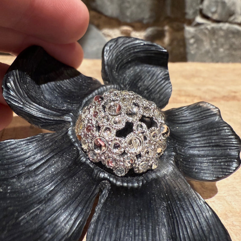 Close-up on Alexis Bittar Crystal Embellished Black Floral Brooch