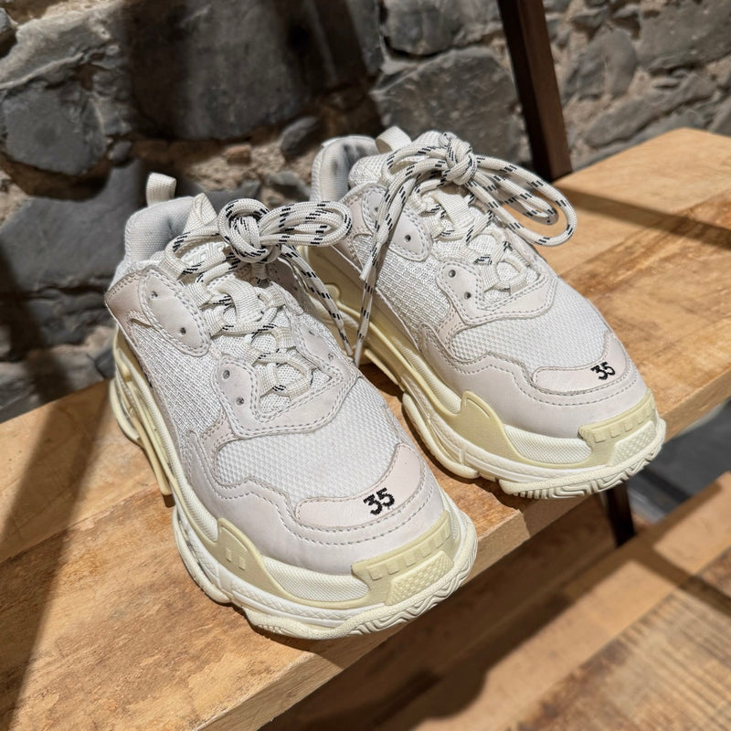 Side front view of Balenciaga White Triple S Chunky Sneakers