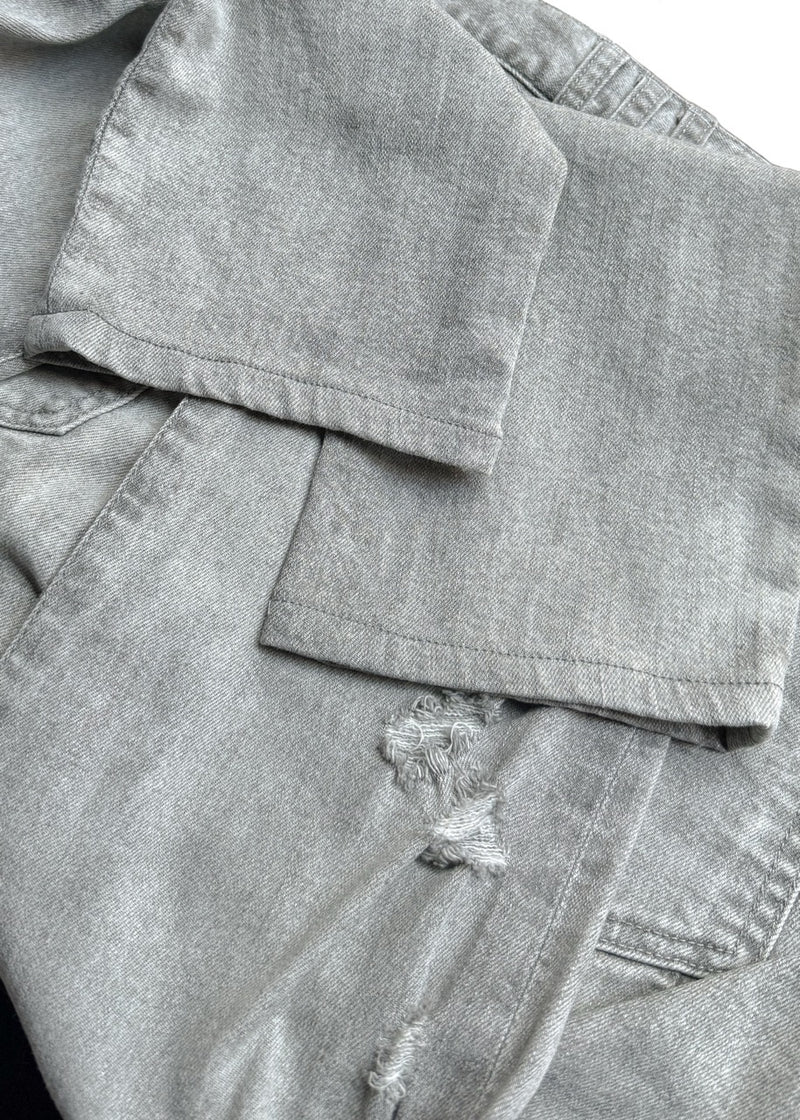 Close-up on Balmain Grey Distressed Slim Jeans