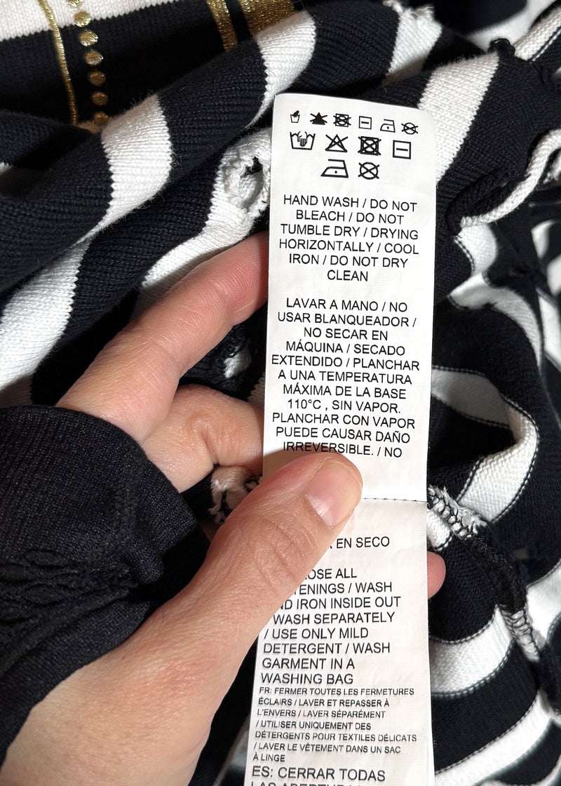 Care label of Balmain X Puma Black Striped Embroidered Distressed Hoodie Sweater