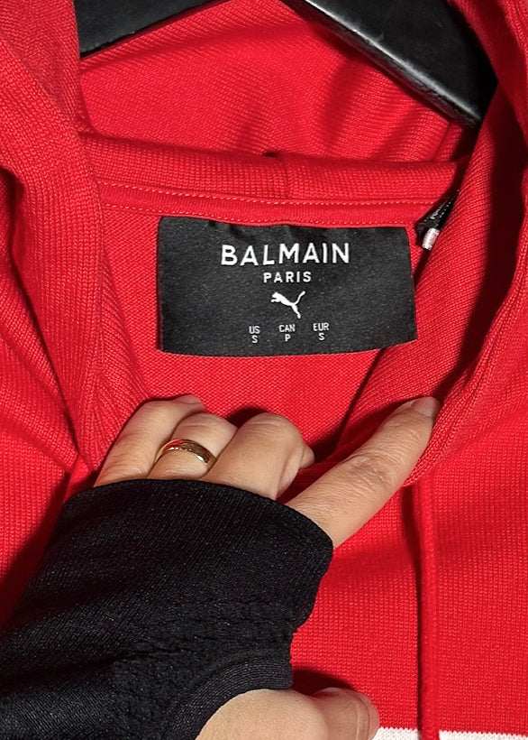 Collar area of Balmain X Puma Red Striped Embroidered Distressed Hoodie Sweater