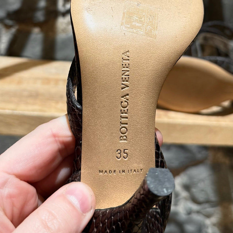 Brand, size and origin stamps of Bottega Veneta Brown Python Embossed The Spiral Heeled Sandals