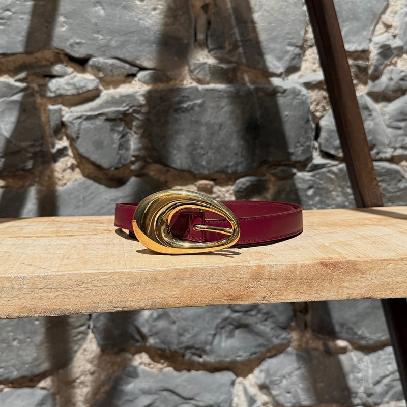 Front view of Bottega Veneta Burgundy Leather Gold Drop Buckle Thin Belt