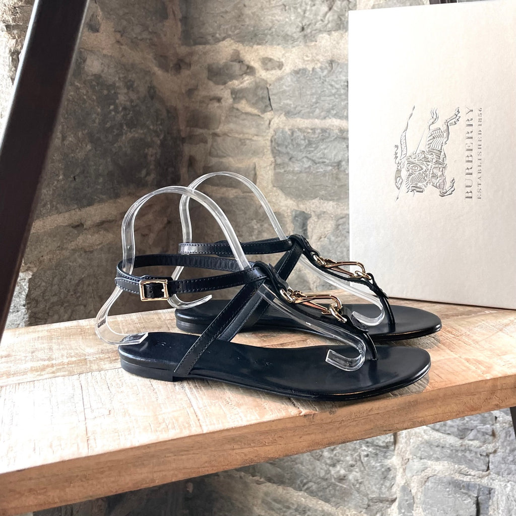 Main photo of Burberry Black Leather Clasp Accent Thong Sandals