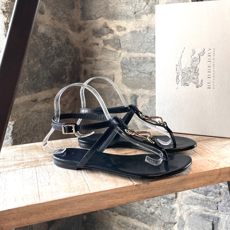 Main photo of Burberry Black Leather Clasp Accent Thong Sandals