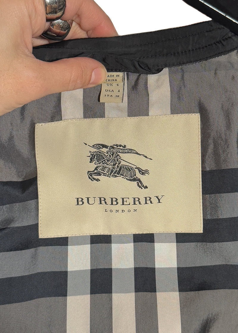 Origin and size label, brand patch of Burberry Black Nylon Patent Piping Trench Coat