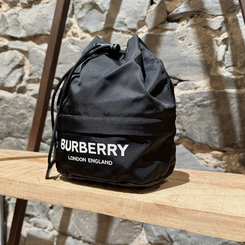 Front side of Burberry Black Nylon Phoebe Drawstring Mini Bucket Pouch