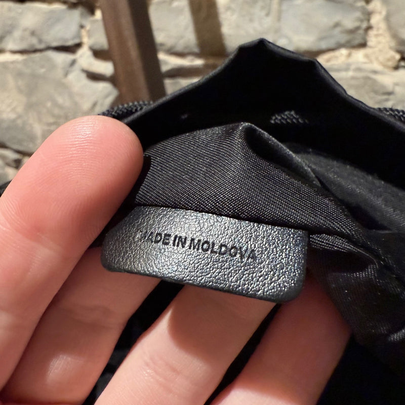 Origin label of Burberry Black Nylon Phoebe Drawstring Mini Bucket Pouch