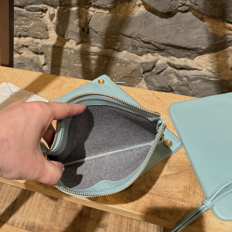 Interior of Céline Light Blue Small Trio Crossbody Bag