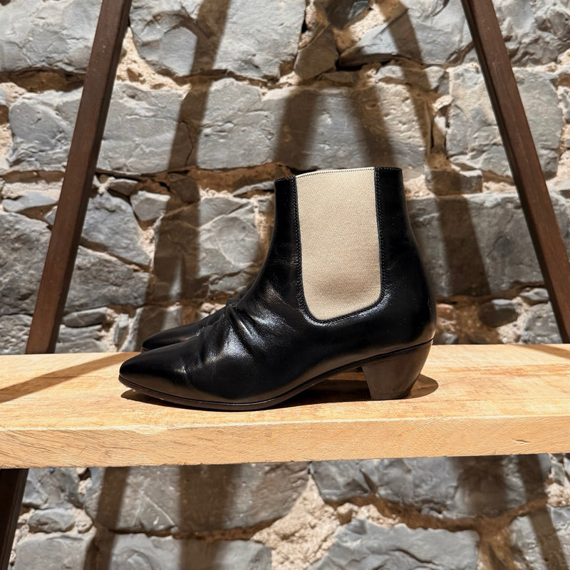 A side view of Céline SS18 Black Leather Chelsea Boots
