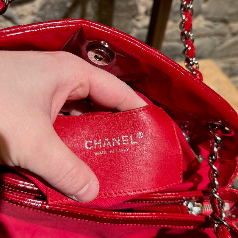 Brand stamp of Chanel 2011 Red Patent Large Just Mademoiselle Bowling Bag