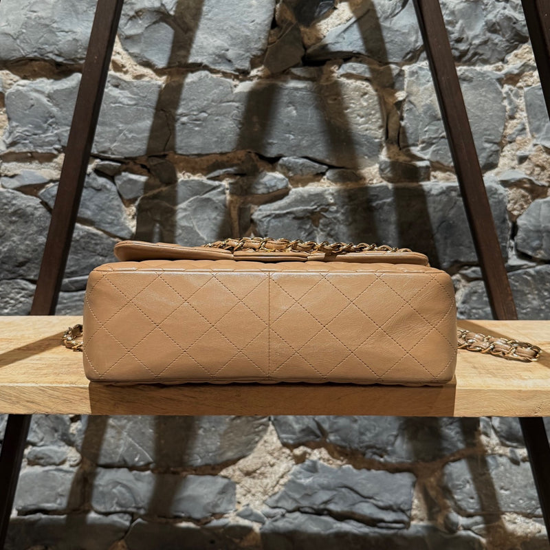 Bottom view ofChanel 2013-2014 Beige Lambskin Jumbo Classic Double Flap Bag