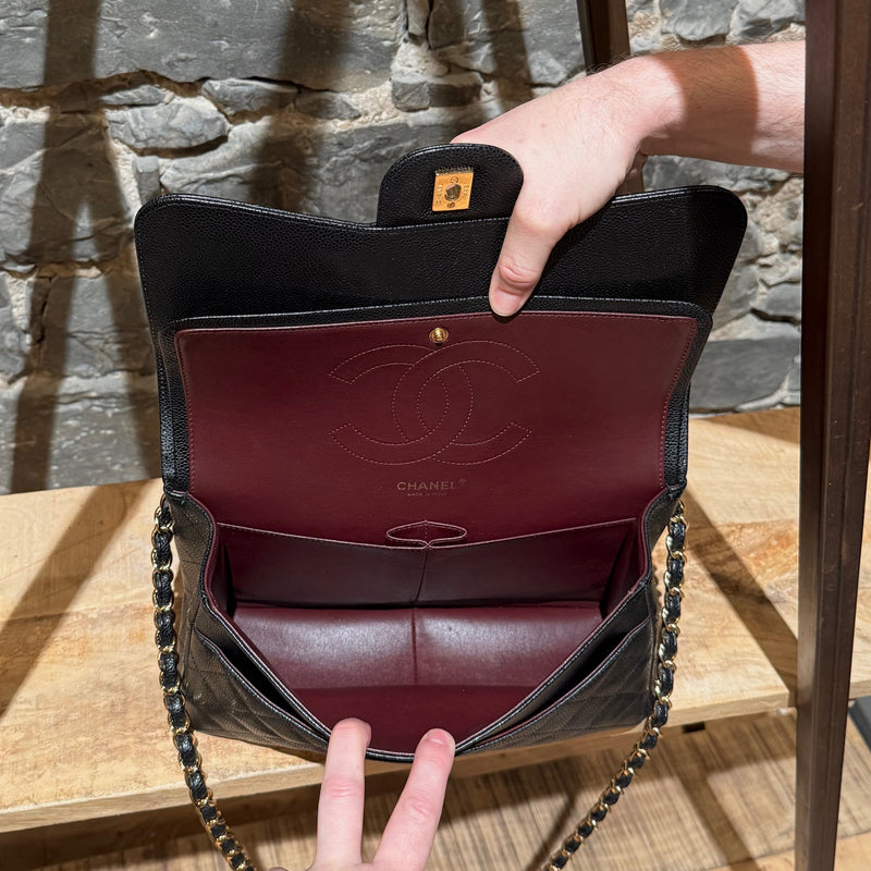 Interior of Chanel Black Caviar Jumbo GHW Classic Double Flap Bag