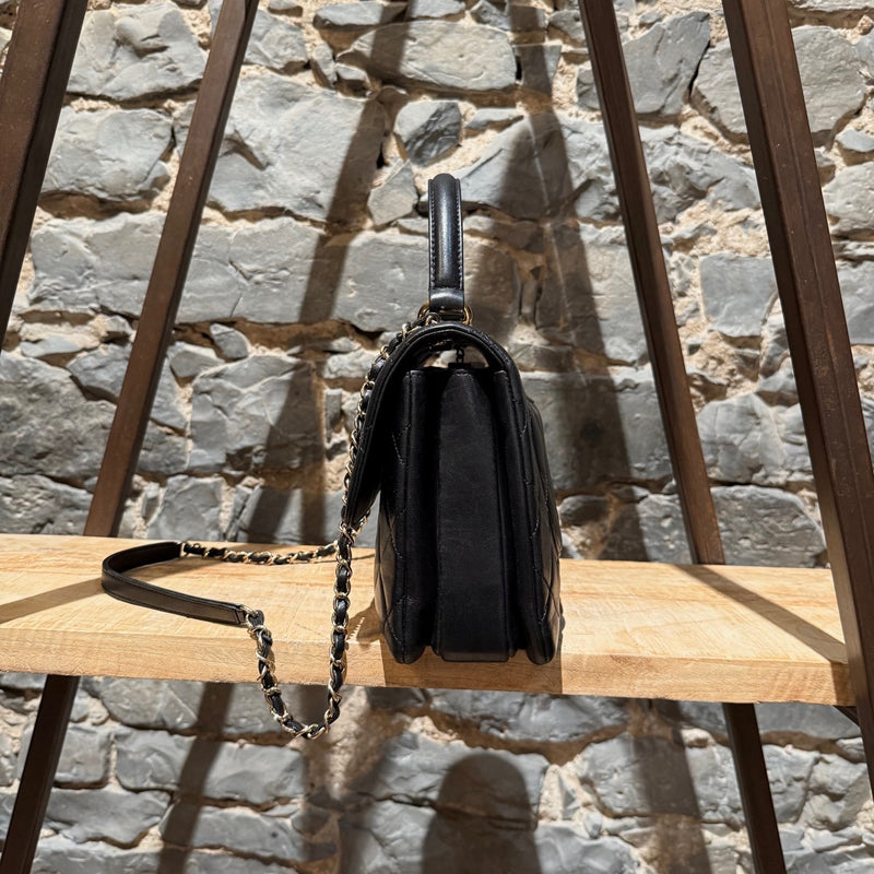 A side view of Chanel 2017 Black Medium Trendy Quilted Top Handle Shoulder Bag