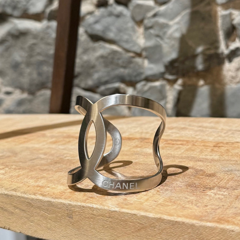 Side front view of Chanel 2017 Palladium Plated Interlocking CC Cuff Bracelet