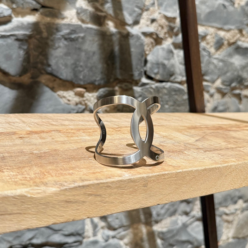 Side front view of Chanel 2017 Palladium Plated Interlocking CC Cuff Bracelet