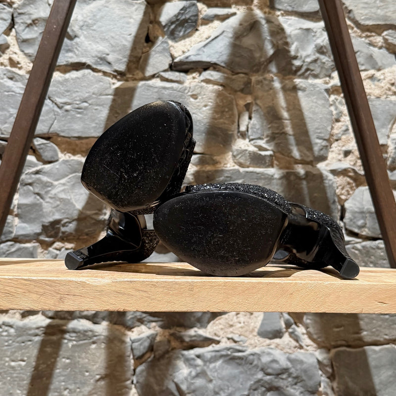 Outsole of Chanel 2021 Black Glitter Platform Peep Toe Pumps