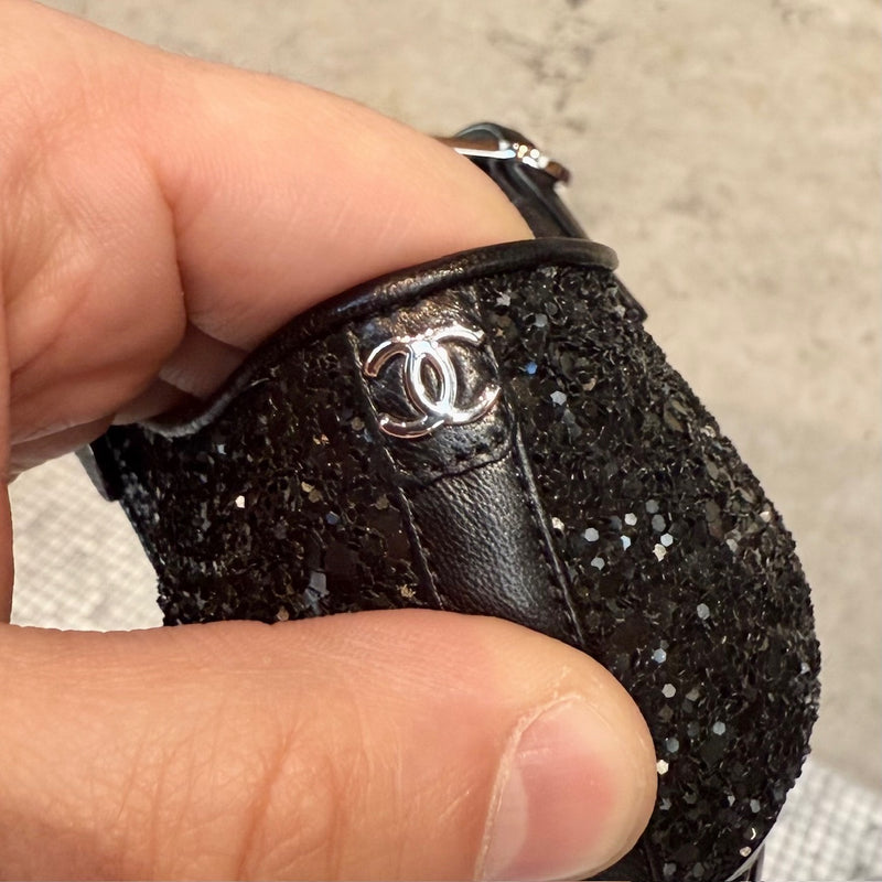 Brand detail of Chanel 2021 Black Glitter Platform Peep Toe Pumps