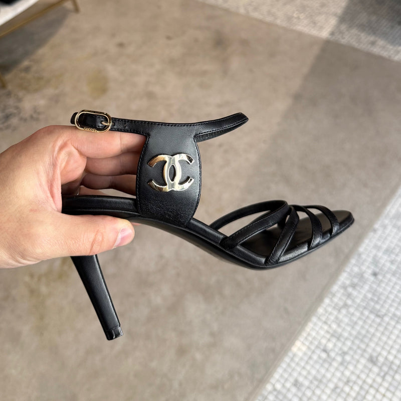 Close-up on Chanel 2021 Black Leather CC Strappy Heeled Sandals