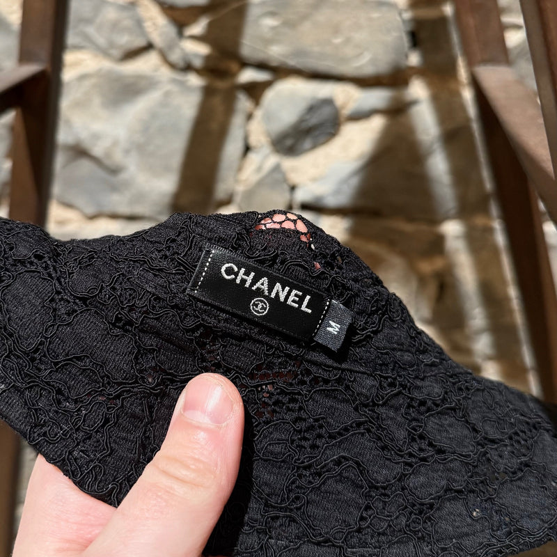 Brand and size labels of Chanel 2021 Coco Beach Black Lace Hat