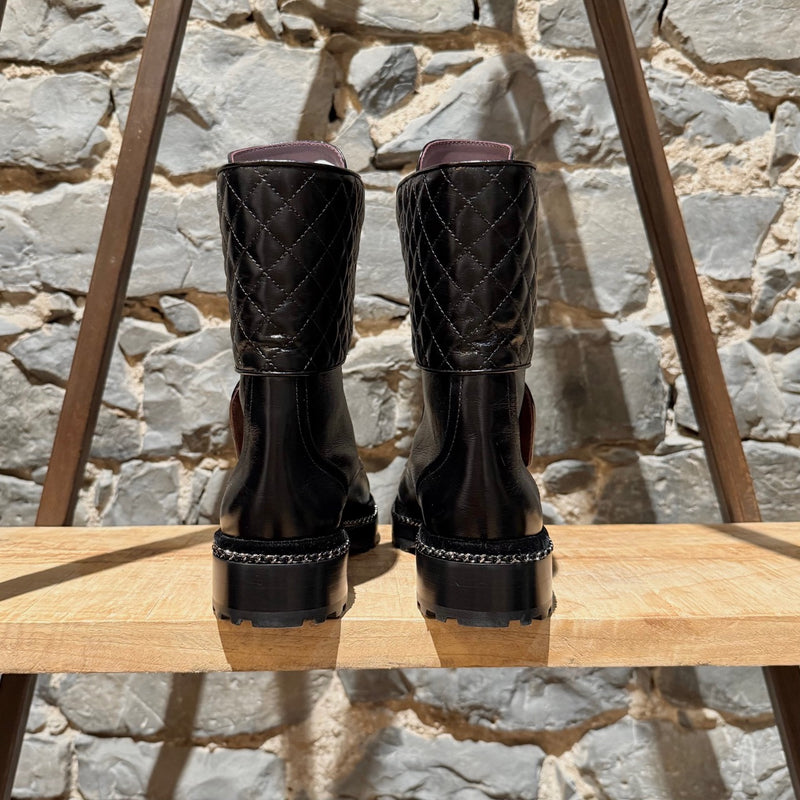 Back view of Chanel Back Glossy Pearl Chain Embellished Combat Boots