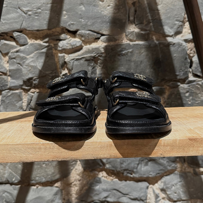 Front view of Chanel Black Caviar Leather CC Dad Slingback Sandals