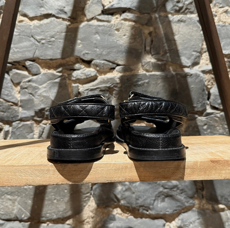 Back view of Chanel Black Caviar Leather CC Dad Slingback Sandals
