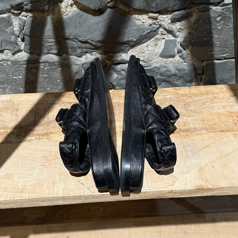 Side-by-side view of Chanel Black Caviar Leather CC Dad Slingback Sandals