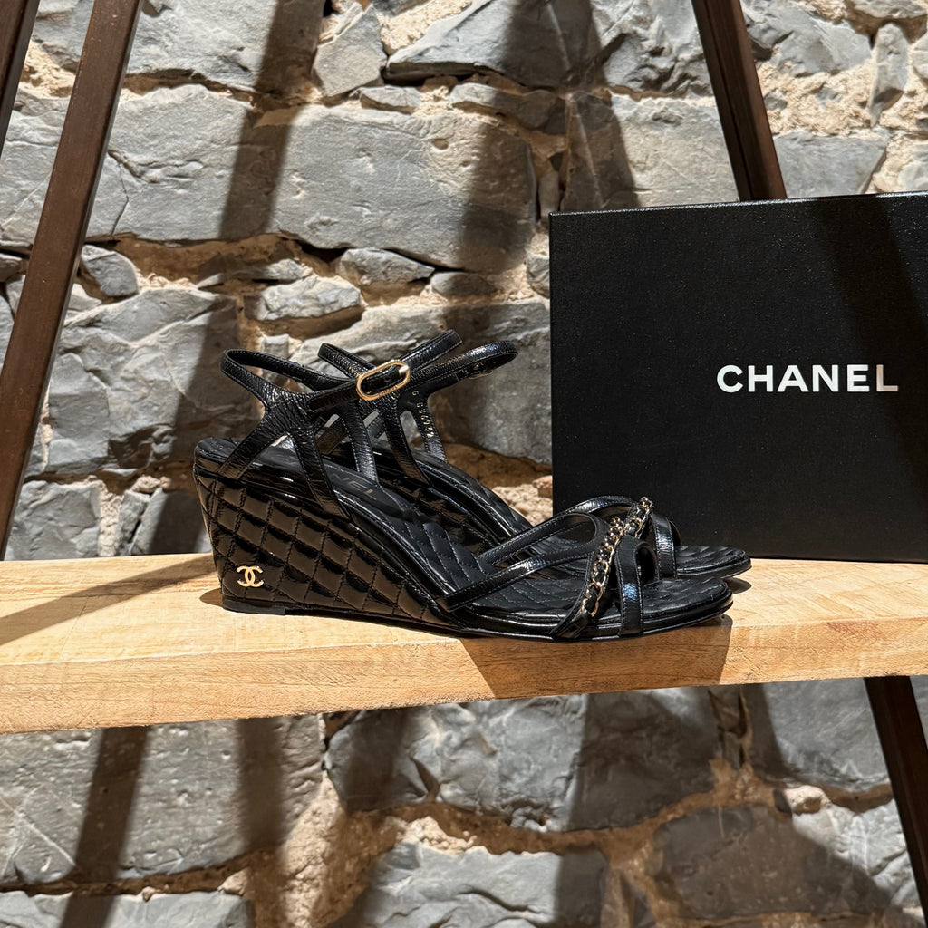 Main photo of Chanel Black Crumpled Leather Chain Accent Quilted Wedge Sandals