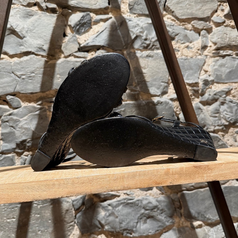 Outsole of Chanel Black Crumpled Leather Chain Accent Quilted Wedge Sandals