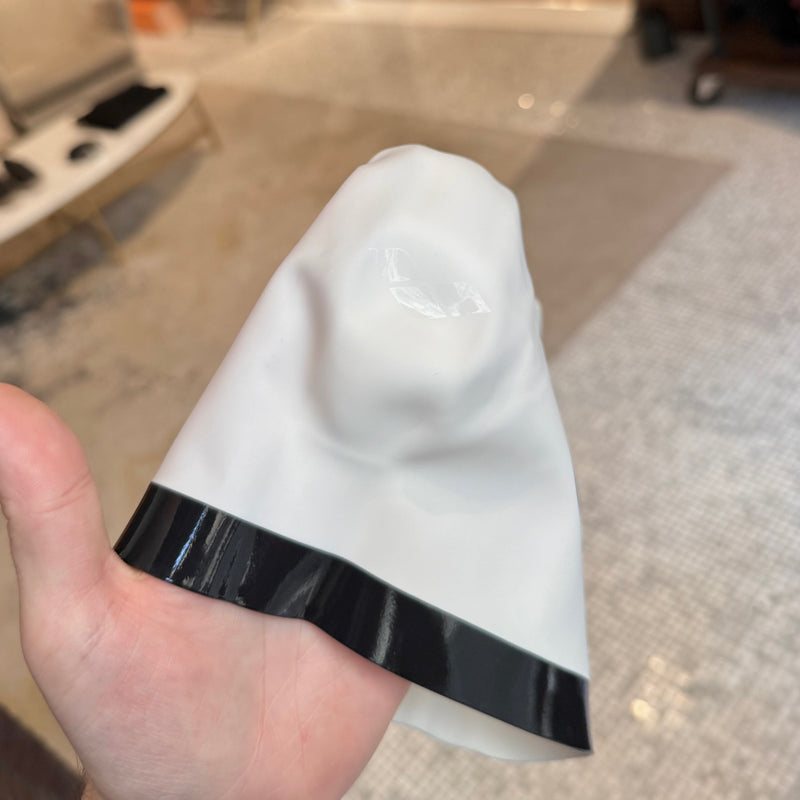 White one side view (Chanel SS24 Set of 2 Black White CC Silicone Swim Caps)
