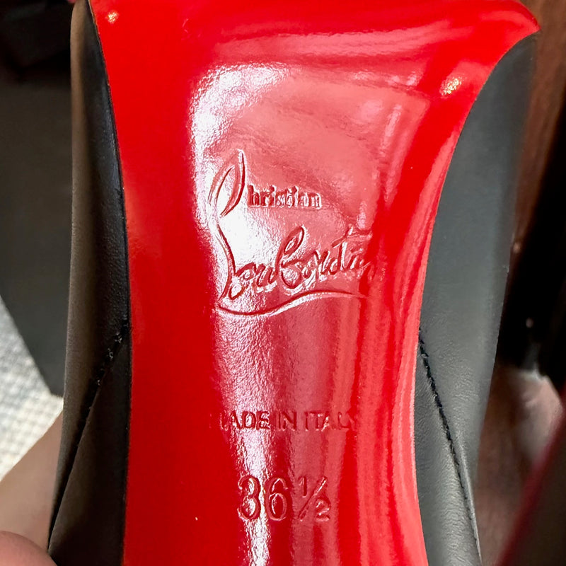 Brand, origin and size stamps on one outsole of Christian Louboutin Astrilarge 100 Booty Black Leather Heeled Boots